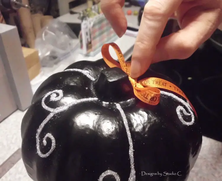 dollar store halloween pumpkin glue ribbon on pumpkin