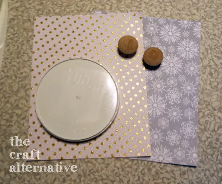 How to Make a Gift Box Using a Plastic Coffee Can cover top with paper