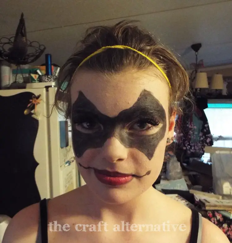 Make It Yourself Harley Quinn Costume practicing makeup