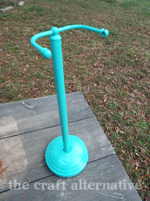 Make a Yarn Holder with a Toilet Paper Stand spray paint in a bright color