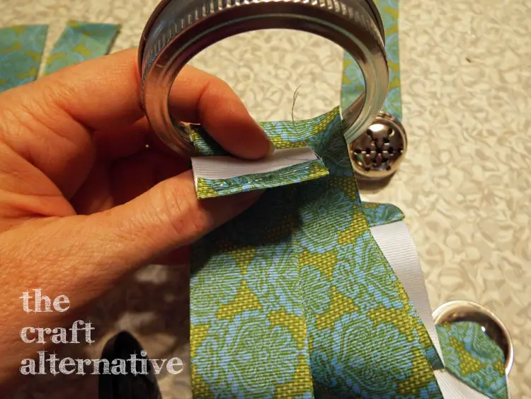Holiday Door Bells glue ends of ribbon to canning jar ring