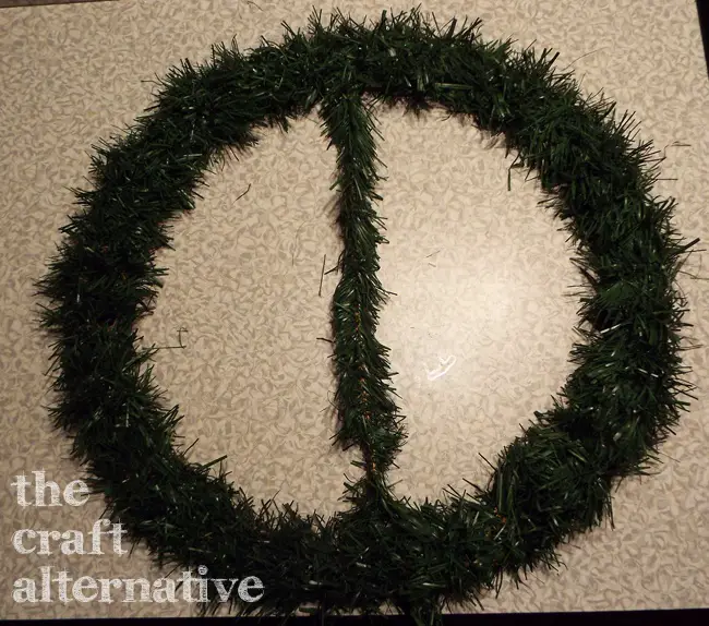 how to make a peace symbol wreath secure a vertical piece of garland