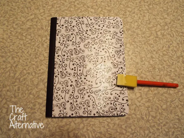 Adding Scrapbooking Paper and Washi Tape to a Composition Notebook_Mod Podge